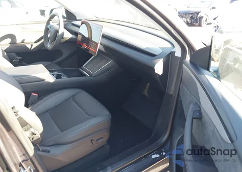 2026 Tesla Model Y from USA, damaged, VIN 7SAYGDED6TA474008